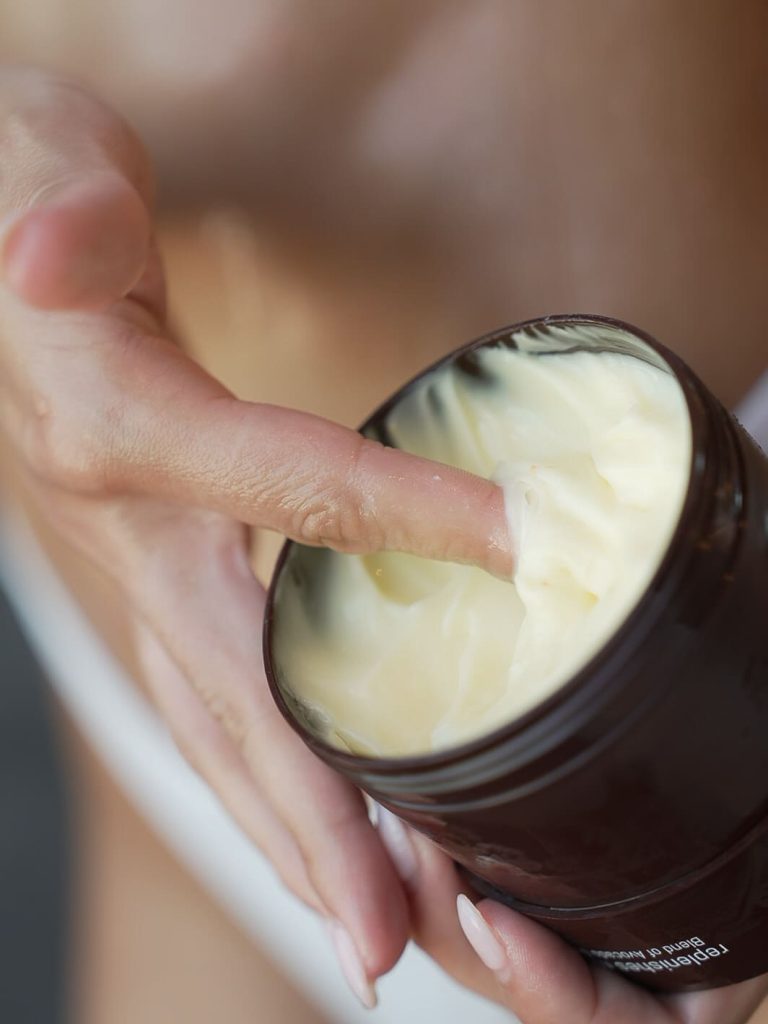 Takkra hair mask open jar being used as hair prep before heat styling